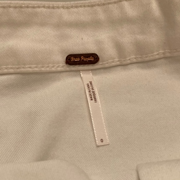 a white jean skirt with buttons - Picture 4 of 4